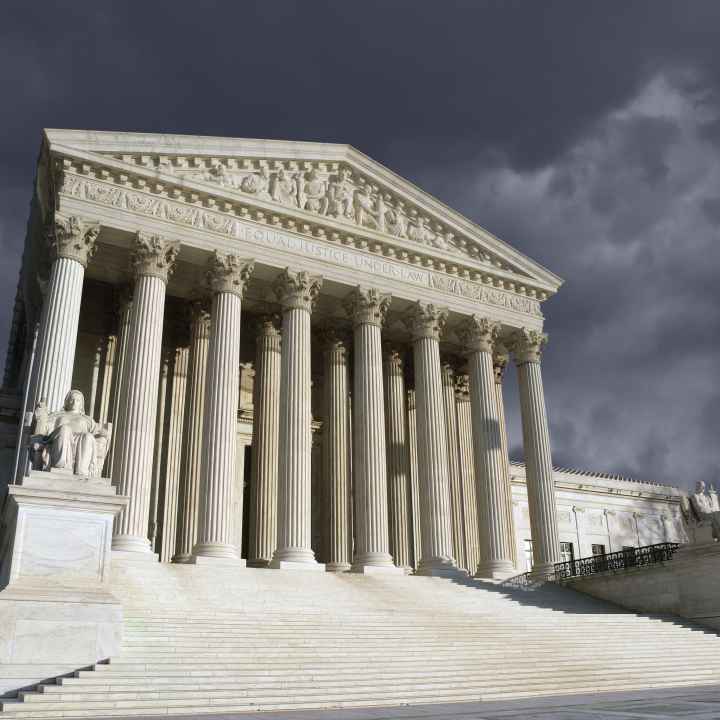 Supreme Court Building with Stormy Clouds
